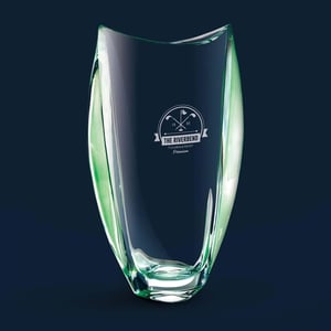 sparkling crystal vase with emerald accents and brand logo