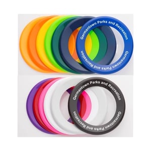 array of multi-colored ring flyer discs with messaging